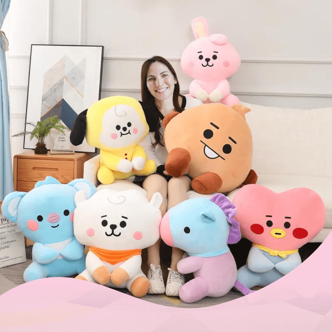 a person sitting on a couch with stuffed animals (Wide Range Of Characters To Choose From)