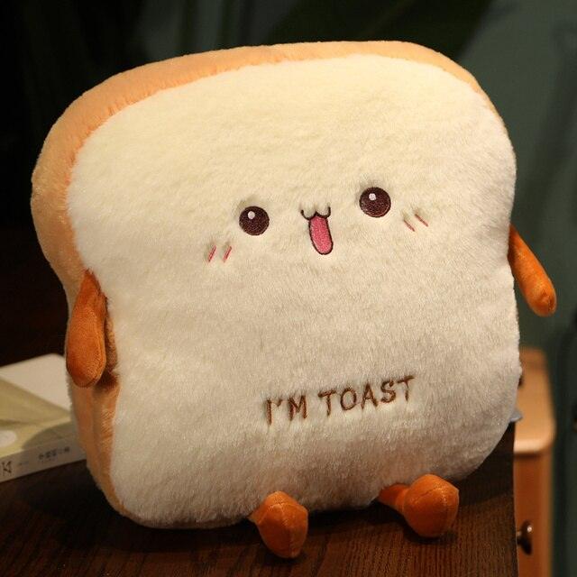 https://kyootii.com/cdn/shop/files/toast-bread-stuffed-toy-plush-kyootii-3-33783641014567.jpg?v=1700114925